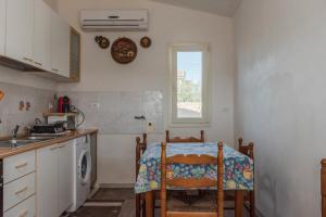 Η κουζίνα ή μικρή κουζίνα στο la Casa di Elvira