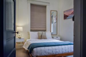 Postel nebo postele na pokoji v ubytování Warner Hotel