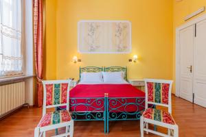 Voodi või voodid majutusasutuse Hotel Principi D'Acaja toas