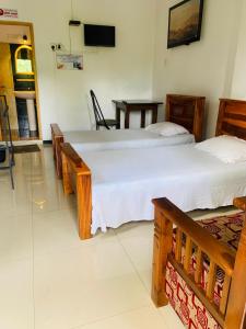 TV a/nebo společenská místnost v ubytování Hotel Change,Badulla