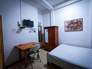 Rúm í herbergi á Hotel Change,Badulla