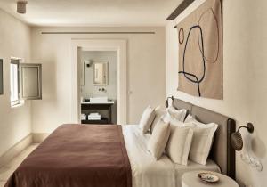 Ein Bett oder Betten in einem Zimmer der Unterkunft Parilio, a Member of Design Hotels