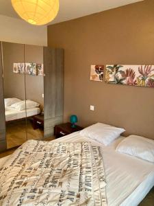 Posteľ alebo postele v izbe v ubytovaní Gîte le Tour 45 m2 Cévennes Lozère