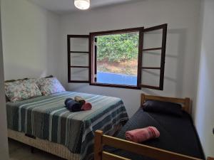 Postel nebo postele na pokoji v ubytování Casa de Campo em Ibiuna em meio à natureza + 47 fotografií