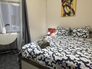 Ένα ή περισσότερα κρεβάτια σε δωμάτιο στο two-room apartment center