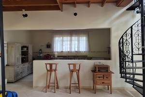 Kuchyň nebo kuchyňský kout v ubytování Refúgio de Lazer e Conforto