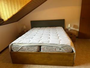 Postel nebo postele na pokoji v ubytování Tess’home