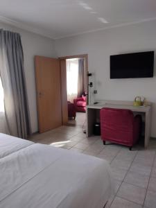Postel nebo postele na pokoji v ubytování Appart-Hotel Gwendy