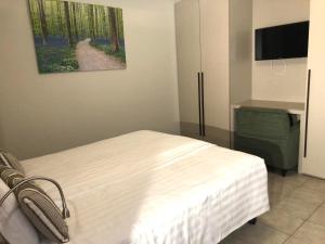 TV a/nebo společenská místnost v ubytování Appart-Hotel Gwendy