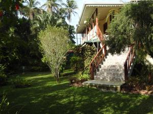 Vrt pred nastanitvijo Playa Negra Guesthouse