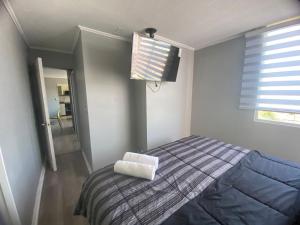 Postel nebo postele na pokoji v ubytování Amplio, comodo y remodelado departamento