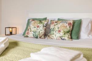 Ένα ή περισσότερα κρεβάτια σε δωμάτιο στο Vila Sun House B +31 φωτογραφίες