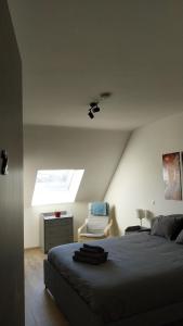 Una cama o camas en una habitación de Duplex Don Bosco C7