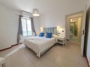 A bed or beds in a room at Pagliarulo Complex by AMALFIVACATION