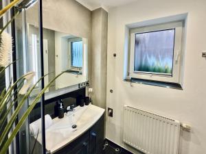 Vannituba majutusasutuses Haus Meerzeit - Altfunixsiel +31 fotot