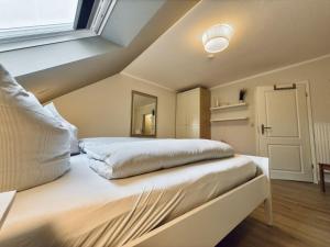 Voodi või voodid majutusasutuse Haus Meerzeit - Altfunixsiel toas