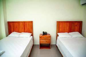 Postel nebo postele na pokoji v ubytování Hotel J&M