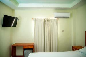 TV a/nebo společenská místnost v ubytování Hotel J&M + 25 fotografií