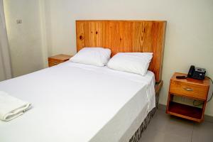 Postel nebo postele na pokoji v ubytování Hotel J&M