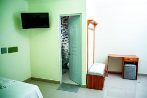 TV a/nebo společenská místnost v ubytování Hotel J&M