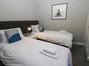 Ένα ή περισσότερα κρεβάτια σε δωμάτιο στο Tommy's Room