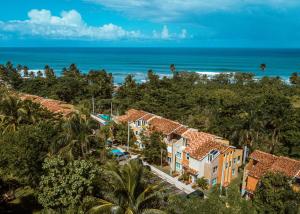 an aerial view of a resort with the ocean in the background at Landing View 204 with private rooftop terrace in Rincon