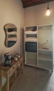 Kuchyň nebo kuchyňský kout v ubytování Apartamento suíte AC Centro de Brotas SP