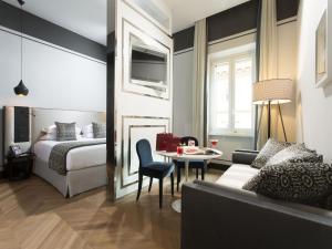 Postel nebo postele na pokoji v ubytování Corso 281 Luxury Suites