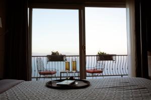 Balkón nebo terasa v ubytování Astra Resort and Caffe