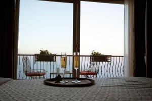Balkón nebo terasa v ubytování Astra Resort and Caffe