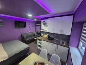 Kuchyň nebo kuchyňský kout v ubytování Rooms Vedran