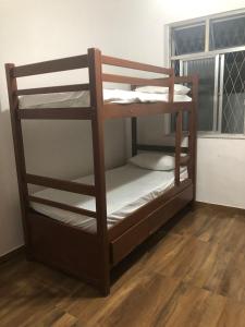 Ένα ή περισσότερα κρεβάτια σε δωμάτιο στο Casa para 8 pessoas Rio de Janeiro Tijuca +34 φωτογραφίες