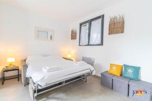 Postel nebo postele na pokoji v ubytování Villa Paradis
