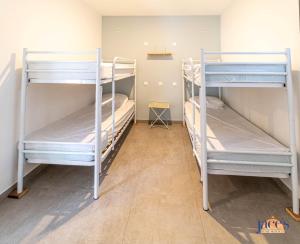 Postel nebo postele na pokoji v ubytování Villa Paradis