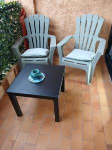 Χώρος καθιστικού στο Studio bord de mer - Plage - Piscine - Wifi