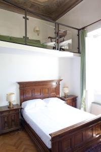 A bed or beds in a room at Classic Hotel