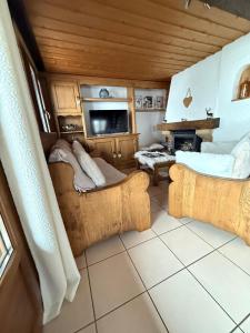 Posezení v ubytování Chalet de Manigod + 37 fotografií