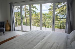 Postel nebo postele na pokoji v ubytování Vera Eco-Resort