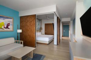 Voodi või voodid majutusasutuse Dreams Cap Cana Resort & Spa toas