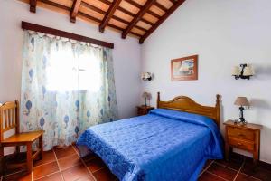 Postel nebo postele na pokoji v ubytování Vivienda Rural Atlántico Sur & Familias