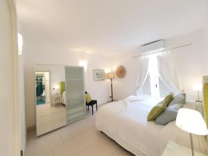 A bed or beds in a room at Pagliarulo Complex by AMALFIVACATION
