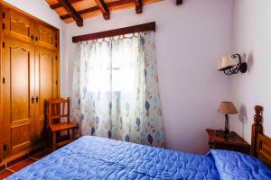 Postel nebo postele na pokoji v ubytování Vivienda Rural Atlántico Sur & Familias