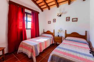 Postel nebo postele na pokoji v ubytování Vivienda Rural Atlántico Sur & Familias