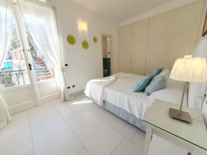 A bed or beds in a room at Pagliarulo Complex by AMALFIVACATION