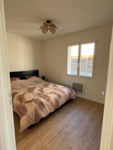 Maison familiale piscine 3 chambres Gujan-Mestras !客房内的一张或多张床位