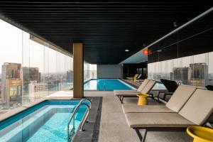 a swimming pool on the top of a building at Resort Home with Extraordinary City View in Mexico City