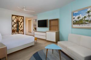 Televiisor ja/või meelelahutuskeskus majutusasutuses Dreams Cap Cana Resort & Spa