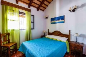 Postel nebo postele na pokoji v ubytování Vivienda Rural Atlántico Sur & Familias