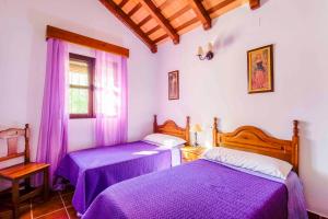 Postel nebo postele na pokoji v ubytování Vivienda Rural Atlántico Sur & Familias