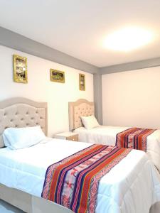 Ένα ή περισσότερα κρεβάτια σε δωμάτιο στο Samin House